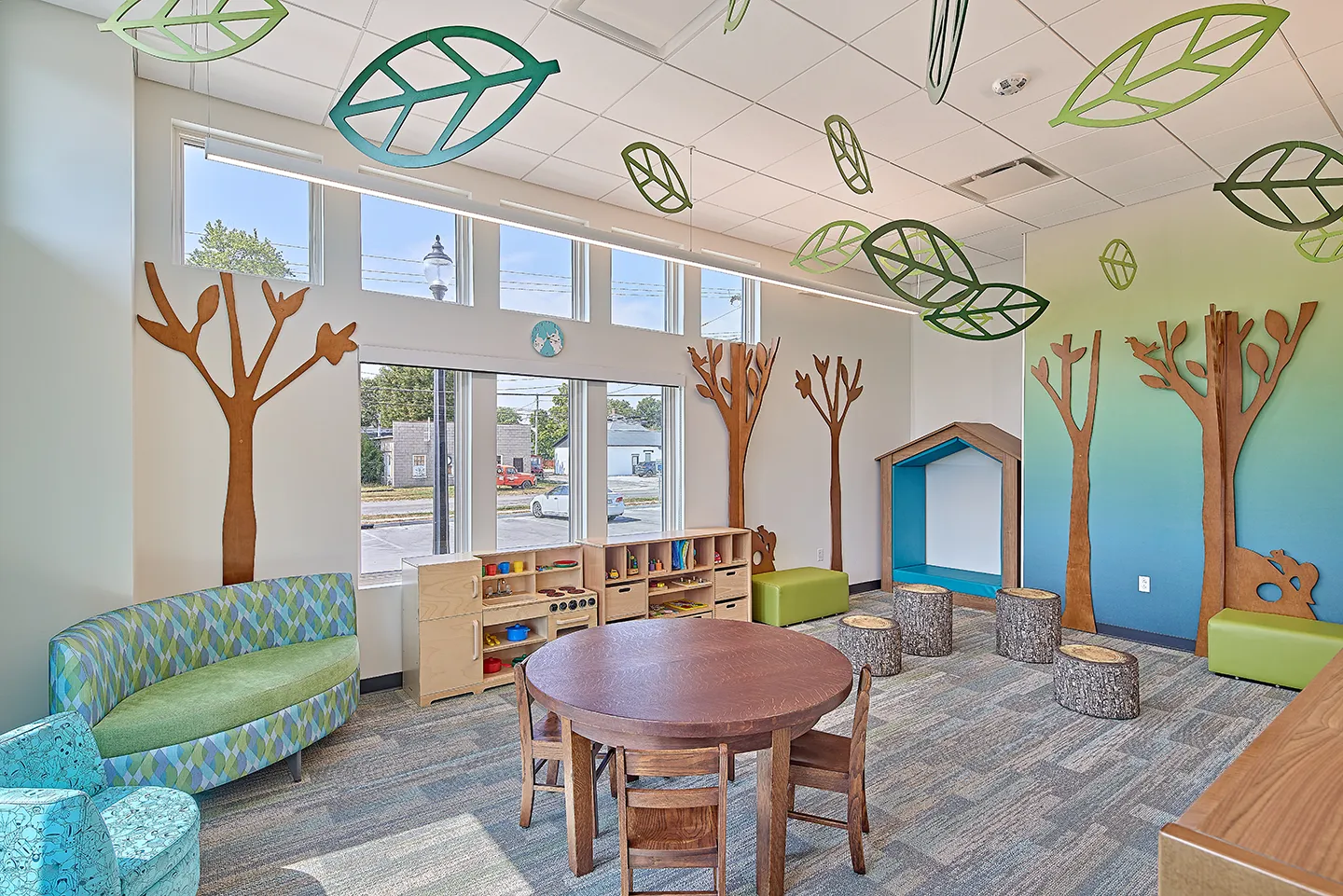 In the kids area, our team chose an immersive nature theme and interactive activities.