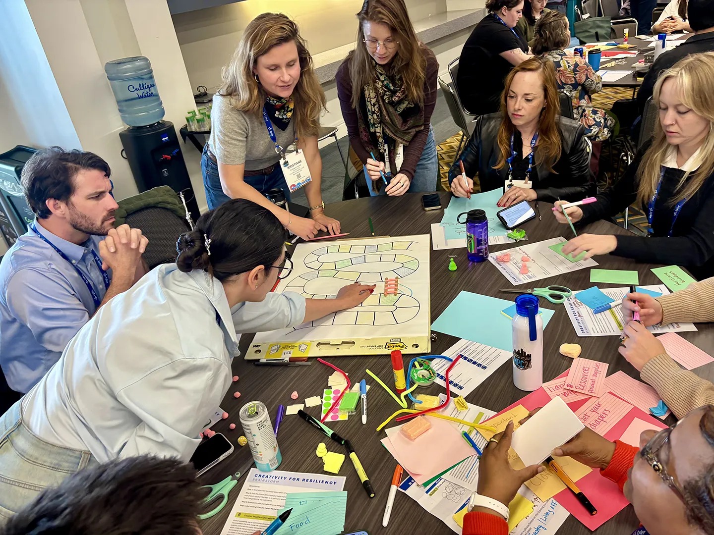 Working in groups, participants developed creative prototypes, including collages, games, plays, parks, fairs, and other engagement tools, to inspire community action.
