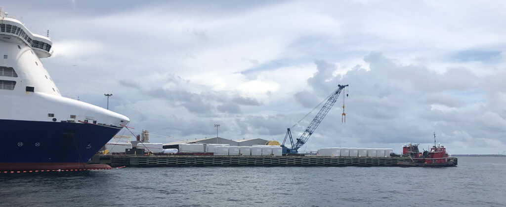 Port-of-Pensacola-Offshore-Wind GE’s nacelles stacked along the Port of Pensacola.