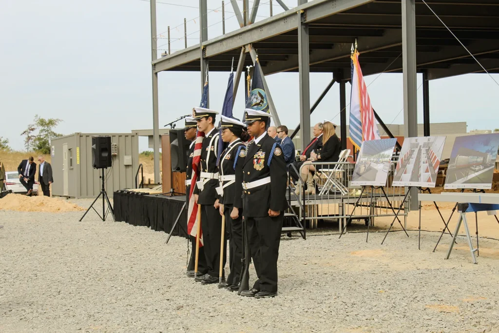 The George Washington High School Navy JROTC unit presents the nation’s colors at the groundbreaking event.