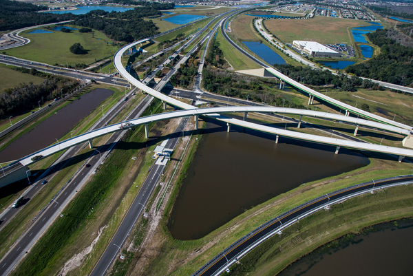 The project included three post-tensioned curved concrete U-beam bridges, the first of their kind in Florida, and a curved steel bridge.