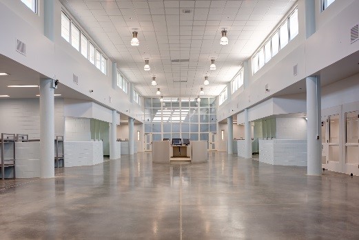 The 43,000-square-foot expansion addresses overcrowding issues and better serves inmates with mental health needs.