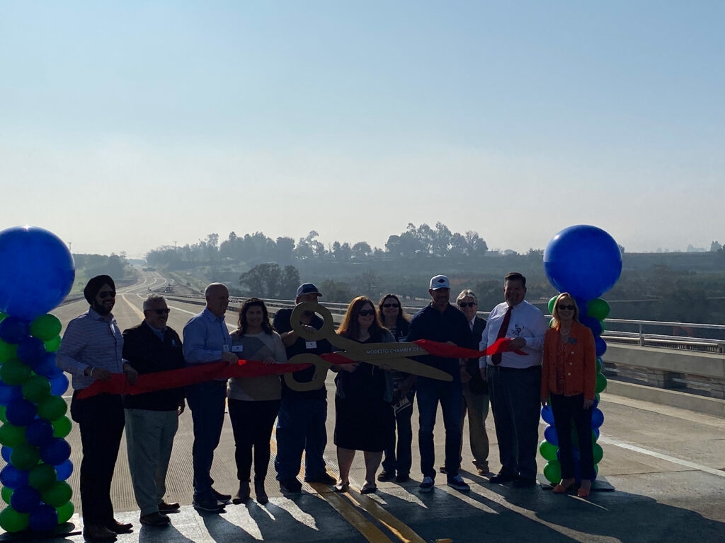 Area representatives, Caltrans, and the Modesto Chamber of Commerce celebrate the opening of the Hickman Road Bridge with Stanislaus County Public Works Director David Leamon.