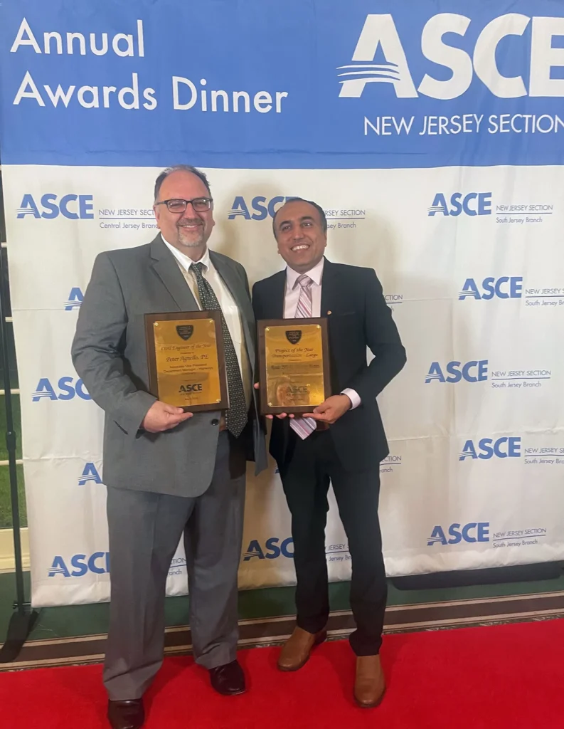 Peter Agnello, PE, and Kirtesh Ladwa, PE, project manager for I-295/Route 42 Missing Moves, with their awards.