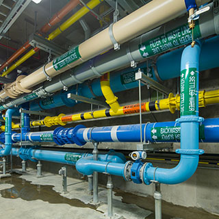 Ranging in size from 4 to 24 inches in diameter, a portion of the RHWPF's nearly 2,200 feet of steel, PVC, and ductile iron piping runs through this pipe gallery. -Photo by Dewberry