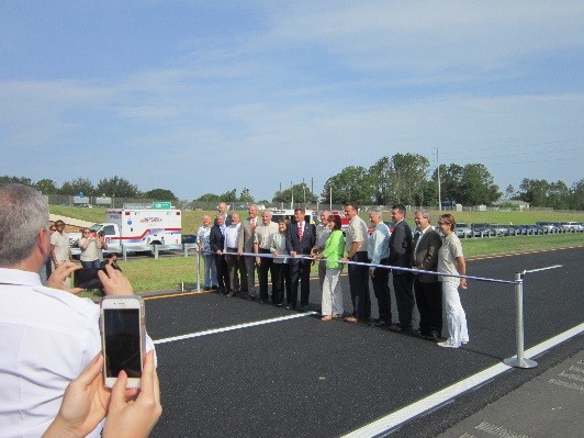 Local officials and community members gathered for a ribbon cutting ceremony for the new 2.3-mile stretch of Wekiva Parkway.