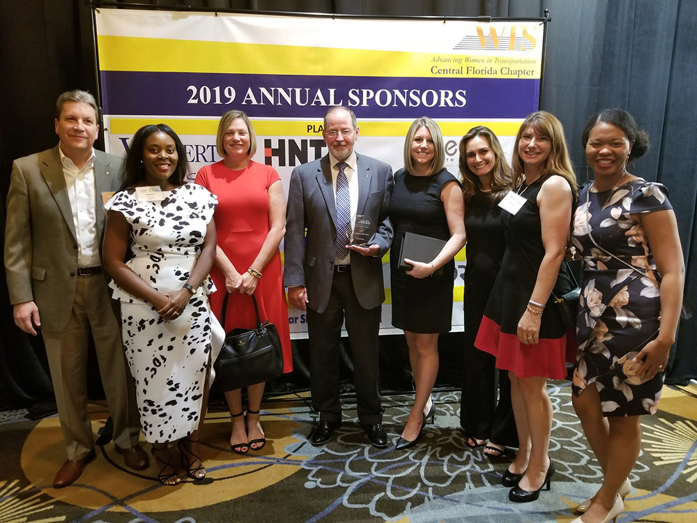 Dewberry’s Don Hammack, Marissa Battle, Marybeth Morin, Kevin Knudsen, Leah Lilly, Hannah Hart, Nicole Gough, and Krystal Somereville.