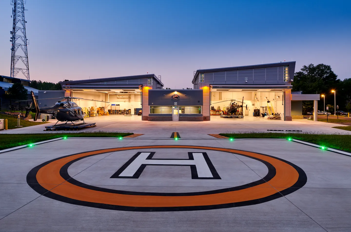 Helicopter apron and hangars allow for efficient loading and unloading.