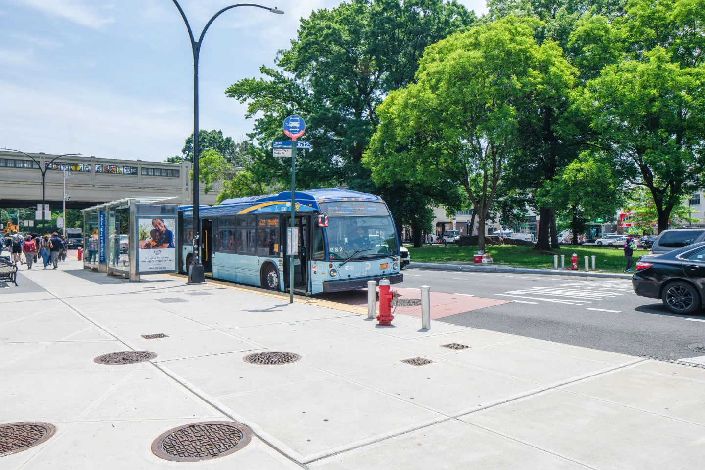 We reconstructed the roadway and added 1.7 miles of dedicated bus lanes. The Select Bus Service lane benefits 49,000 bus riders daily.