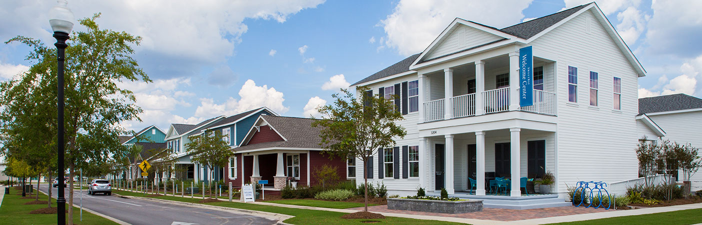 The community is designed around four pillars: walkability, preservation of the bay front, honoring local history and traditions, and promoting wellness through outdoor living.