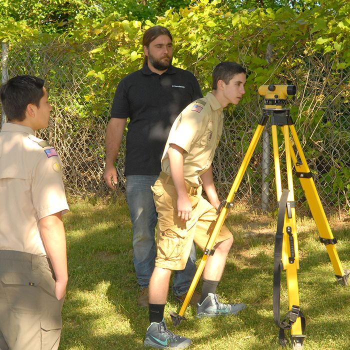 Scouts learn how to survey from Dewberry employee.