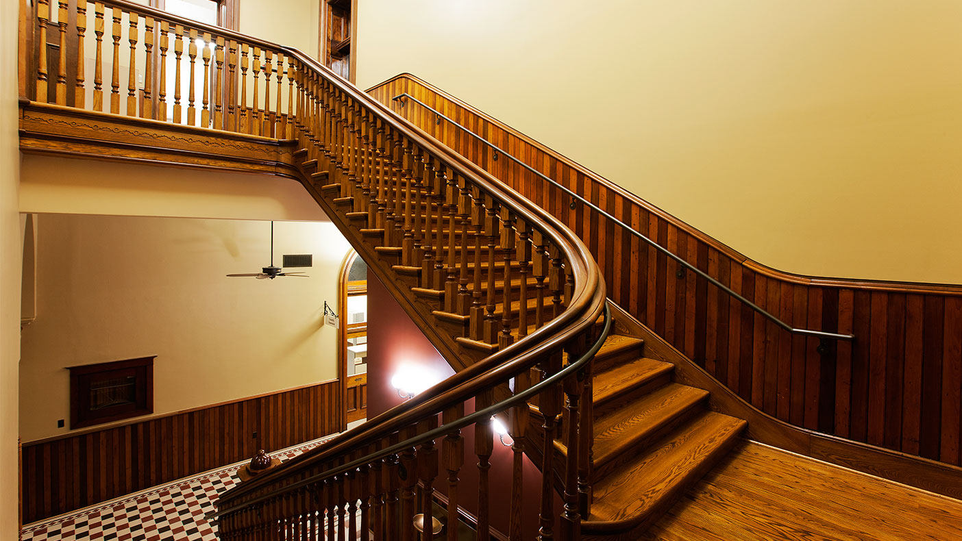 As part of the project, we restored the historic open wood staircases and remodeled the basement for modern office use.